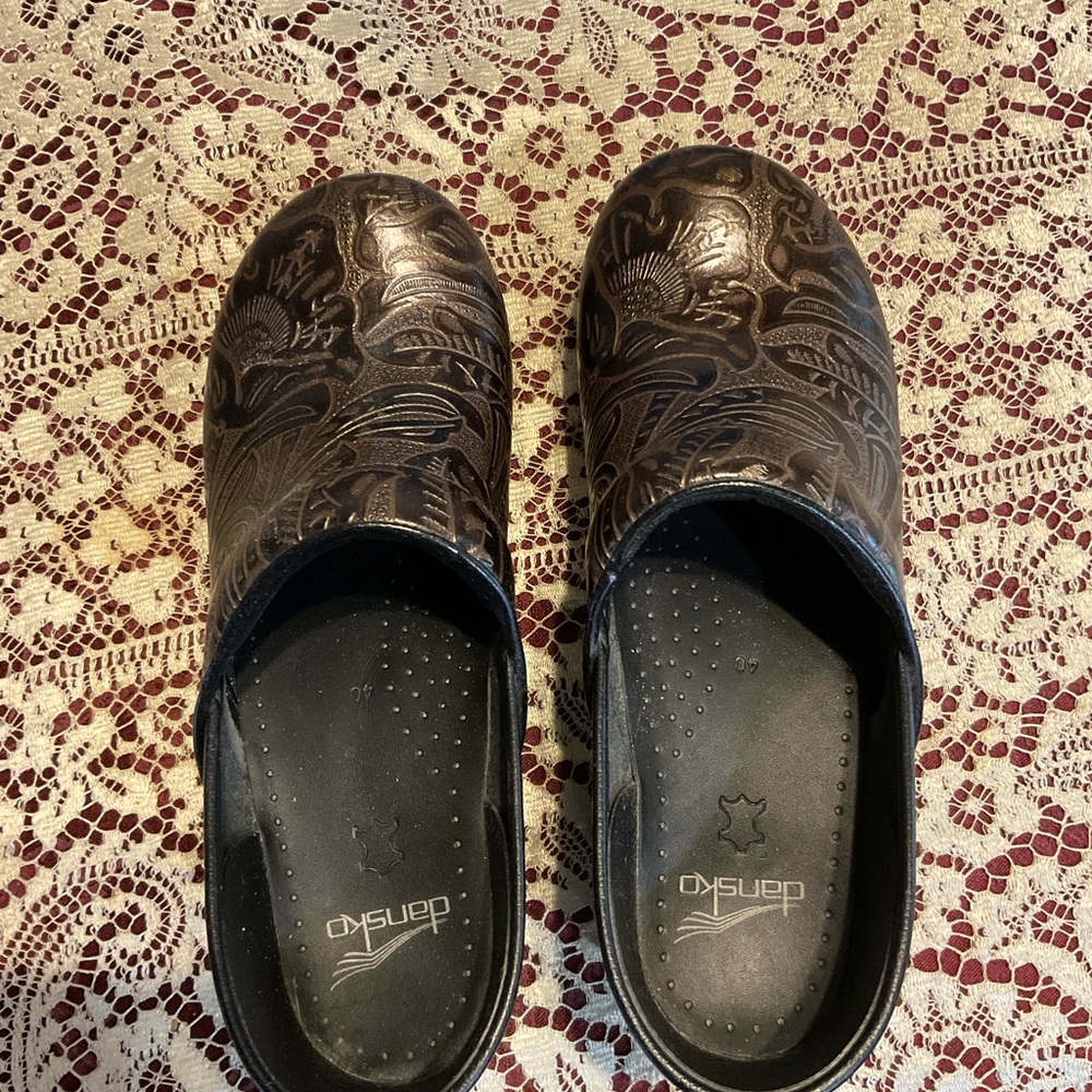 Dansko tooled leather clogs